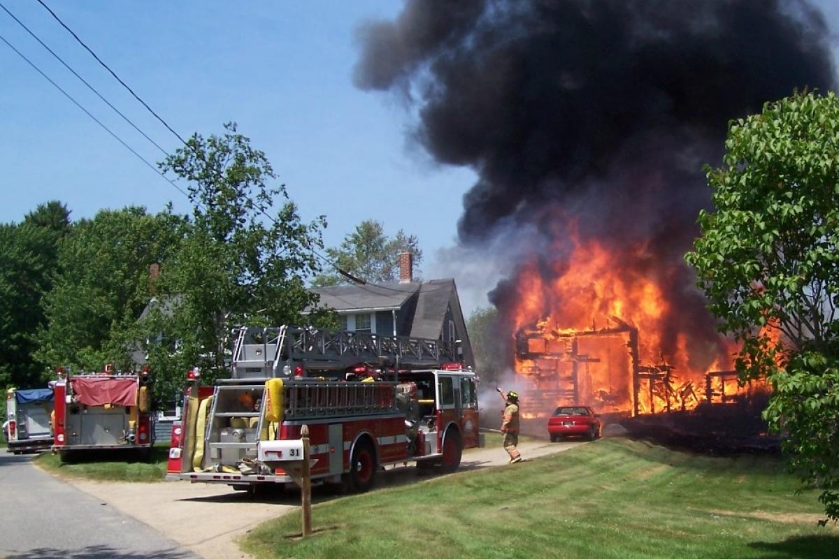June 2007: Kennebunkport firefighters arrive at the scene a barn on fire on Mt. Kineo Road. A quick interior attack prevented serious damage to the adjacent house.