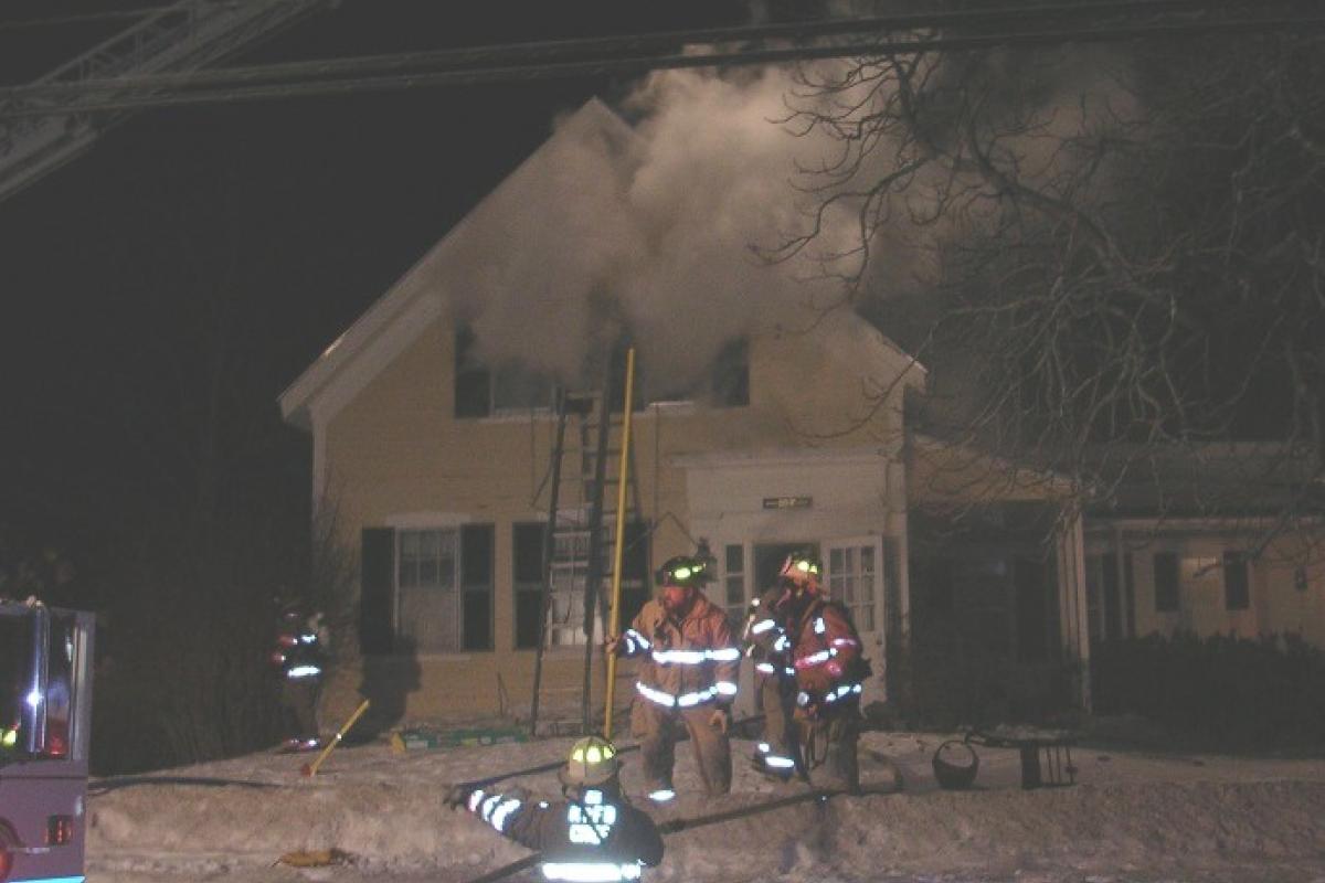 January 2014: Firefighters prepare to make entry at a structure fire in Cape Porpoise. Mutual aid crews from Biddeford and Kennebunk assisted in extinguishing the fire and containing the damage to a small area of the home. (Photo courtesy of Freeland D. Smith)