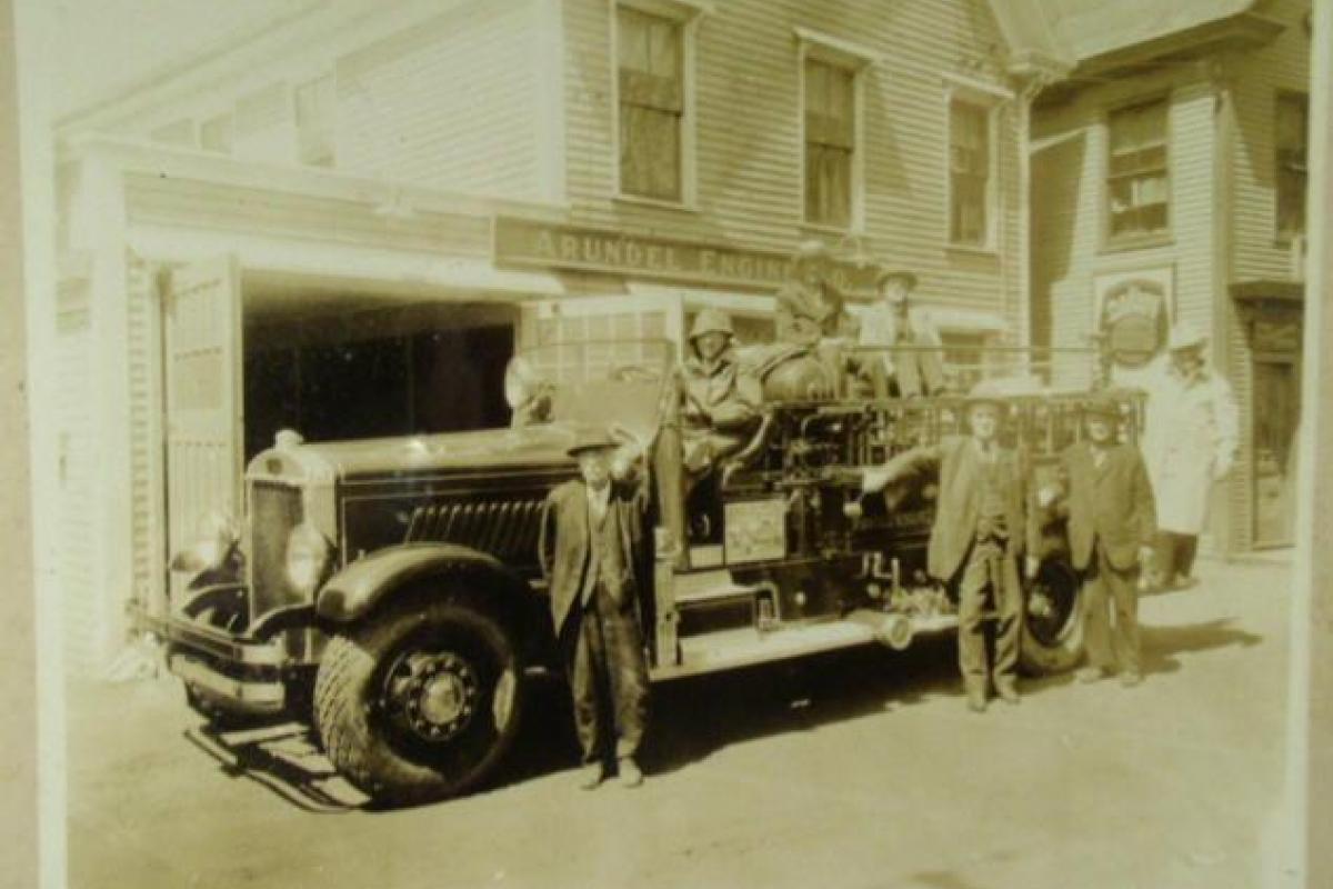 Senior members of the Arundel Engine Company pose with the 1929 Mack 1000gpm Pumper in front of the old station at 31 Ocean Ave in about 1931. 