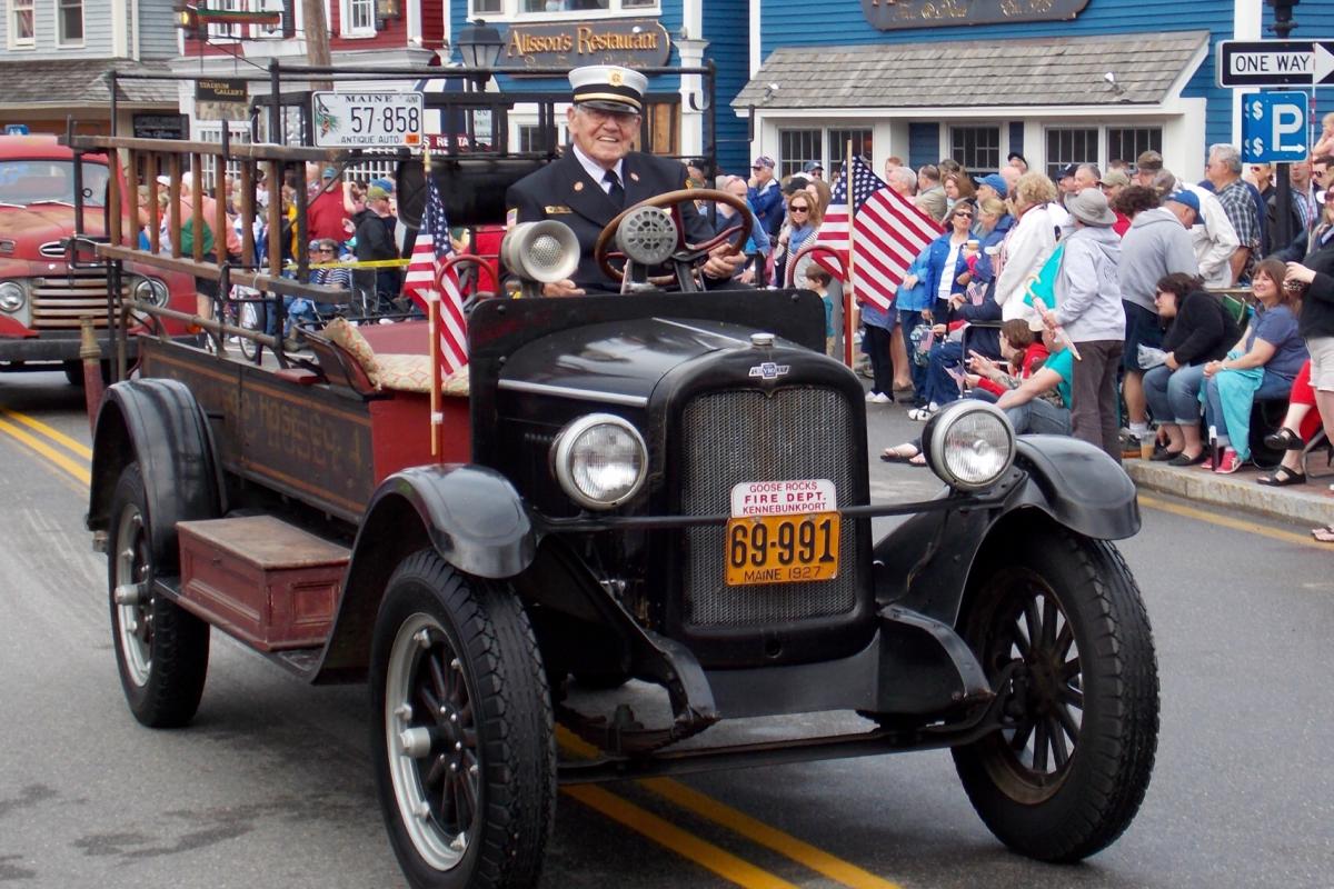 Firefighter Freeland K. Smith runs Beachwood Hose 4, the 1927 Chevrolet, at the 2014 Memorial Day parade. (Photo coutesy of Michaela) 